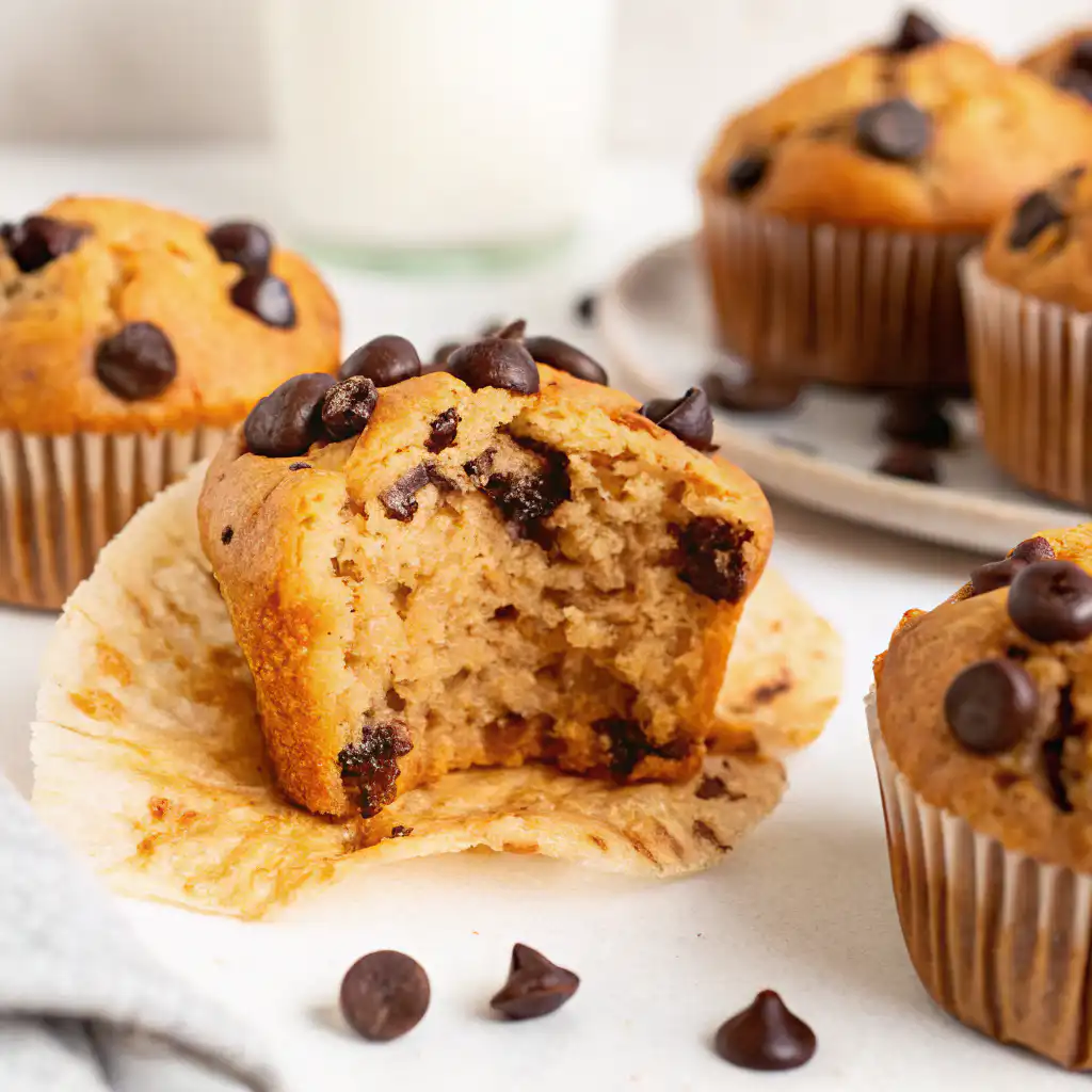 Bitten banana protein muffin with gooey chocolate chips