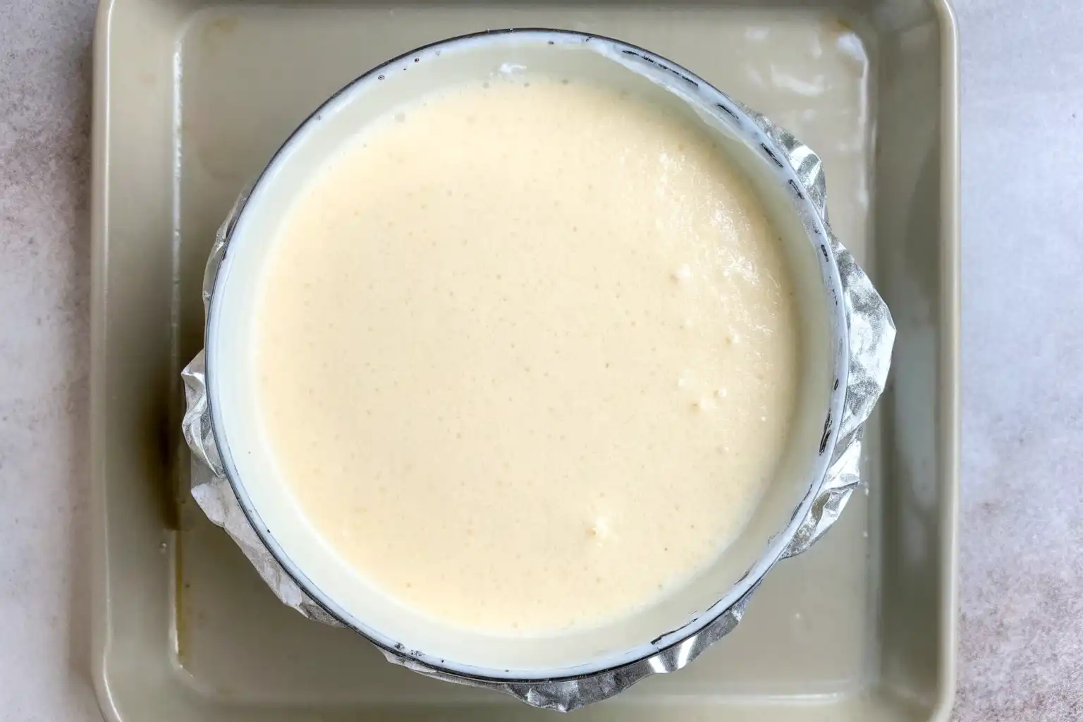 Cloud cake batter in springform pan before baking