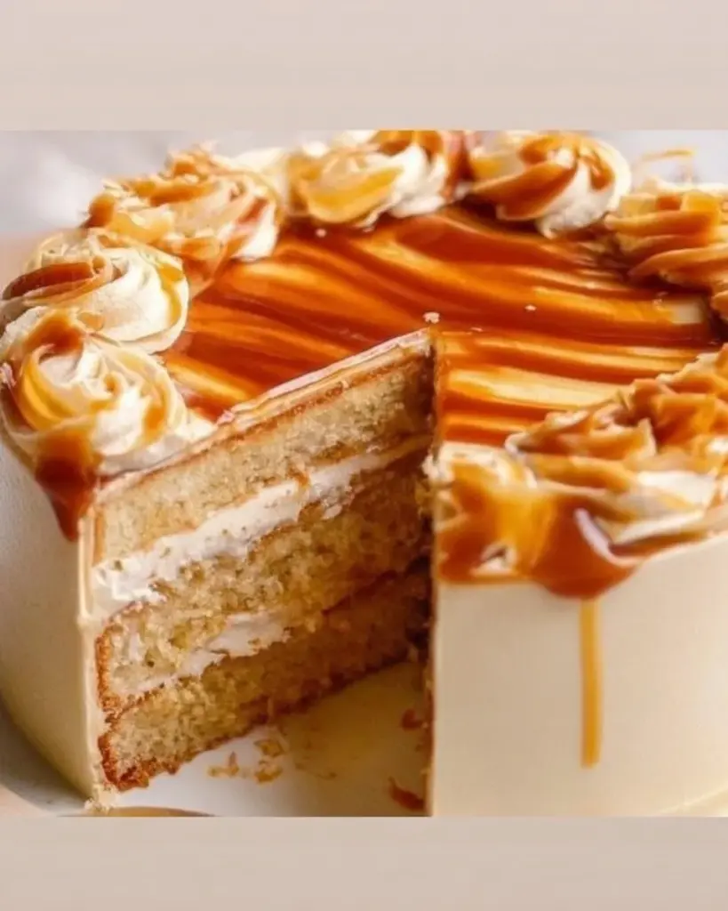 Decadent salted caramel cake topped with a luscious caramel drizzle and sea salt flakes.