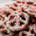Delicious candy cane peppermint pretzels topped with crushed candy canes