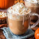 Delicious Pumpkin Spice Hot Chocolate topped with whipped cream and spices