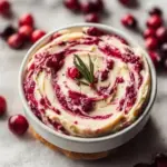 Homemade Christmas Cranberry Honey Butter spread on toasted bread