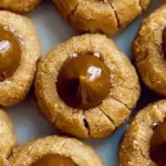 Delicious classic peanut butter blossoms cookies topped with chocolate kisses
