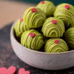 Decadent Grinch Oreo Truffles decorated for the holidays
