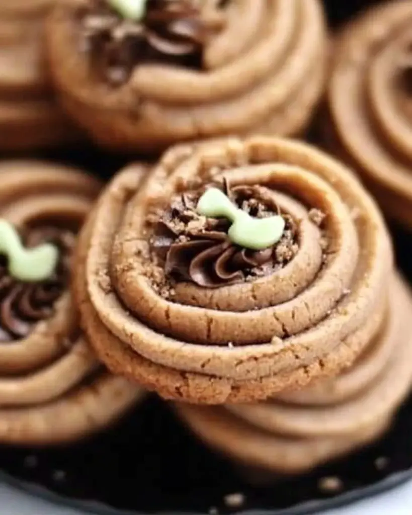Melt-in-your-mouth coffee butter cookies on a festive plate