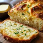 Two-ingredient cottage cheese bread sliced and ready to serve