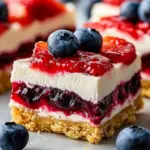No-Bake Flag Cheesecake Bars decorated in a patriotic style